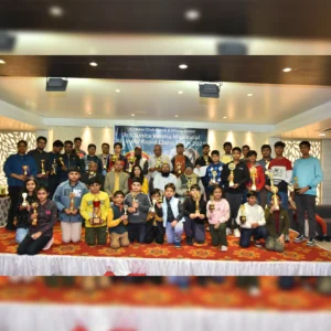 group of students and coach taken group photo after wining chess tournament